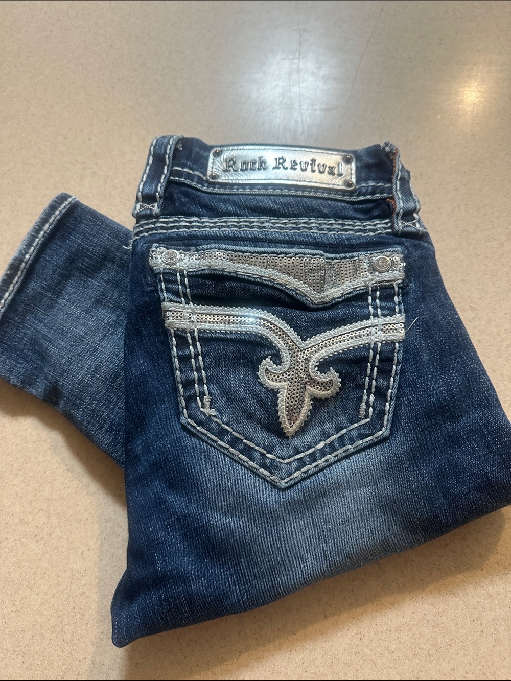 Rock Revival Women’s Dark Blue Skinny Jeans with Silver Embellished Pockets